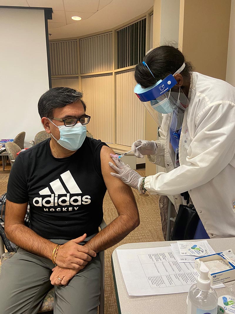 Dr._Jain_getting_COVID_vaccine.jpg
